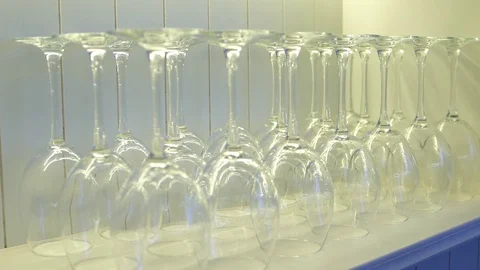 A lot of empty glasses on white table - 4k Video stock 104974863