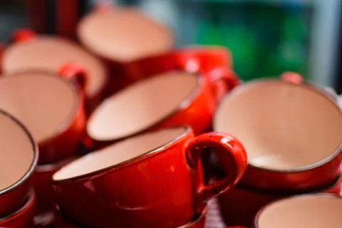 A lot of empty red cups for tea in a cafe Stock Photos