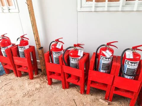 A lot of fire extinguishers Stock Photos