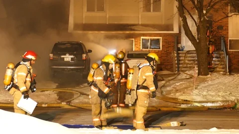 A lot of firefighters at night Stock Footage 125417830