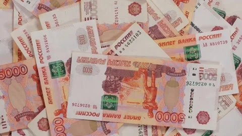 A lot of five thousand Russian banknotes are slowly rotating in a circle. Stock Footage 315093657