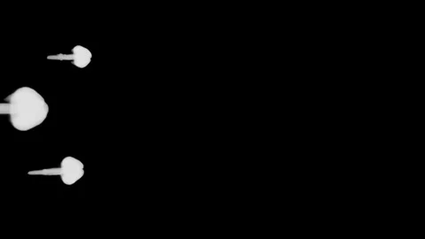 A lot of flows of fluorescent blue ink or smoke, isolated on black in slow Stock Footage