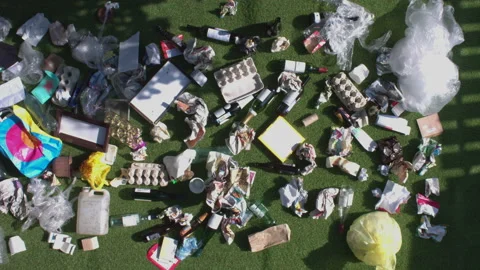 A lot of garbage on the grass. Top view. Видео 125500080