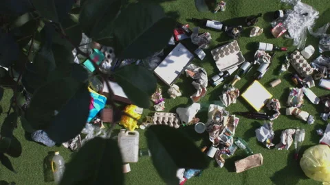A lot of garbage on the grass. Top view. Video stock 125500094