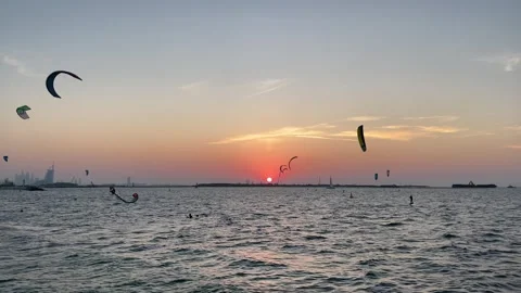A lot of kiters are having fun in Dubai kite beach Stock Footage 323633687