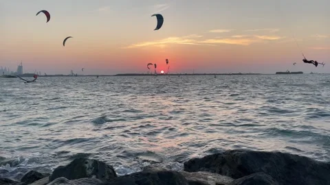A lot of kiters are having fun in Dubai kite beach Stock Footage 323635151