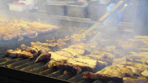 A lot of meat on a hot grill Stock Footage 33631028