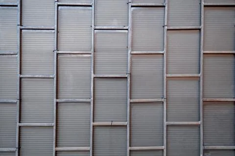 A lot of metal frames are rectangular in shape, into which corrugated glass. Stock Photos
