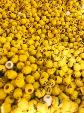 A lot of Mini figures Lego with different prints and designs, different facial Stock Photos