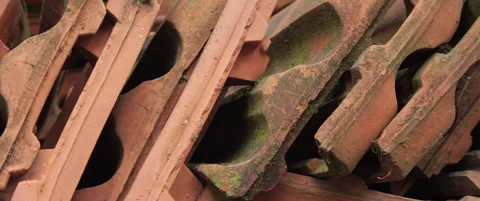 Lot of old clay tiles in a row 5.7K anamorphic video Video stock 310652050