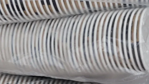 A lot of paper cups in a row, in a cellophane pack 库存影片 166118752