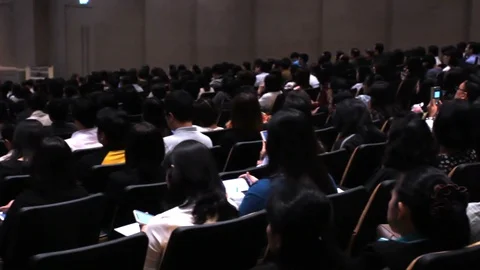 A lot of people in the auditorium. Stock Footage 100976541