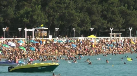 A lot of people on the beach Stock Footage 7902998