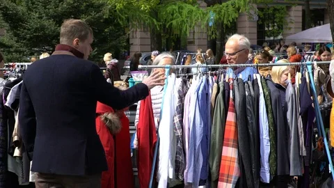 A lot of people at the flea market in the city Park Stock Footage