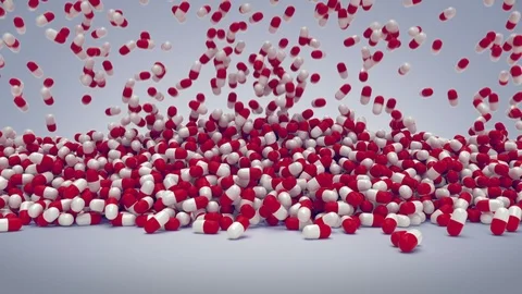 Lot of pills falling with alpha mask Stock-Footage 100143372