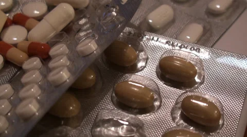 A lot Of Pills On The Table. Using of Camera Dolly. Stock Footage 35247608
