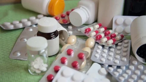 A lot of pills, tablets, various blister pack and bottles, dolly shot Stock Footage 69784770