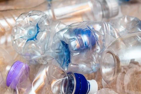 Lot of plastic crumpled empty bottles pollution recycle eco concept backgroun Foto stock