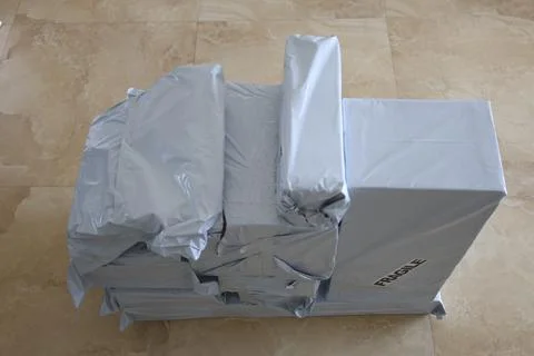 Lot of post packages in gray plastic bags Photos