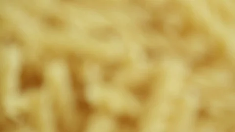 A lot of raw twisted pasta Stock Footage 83759637