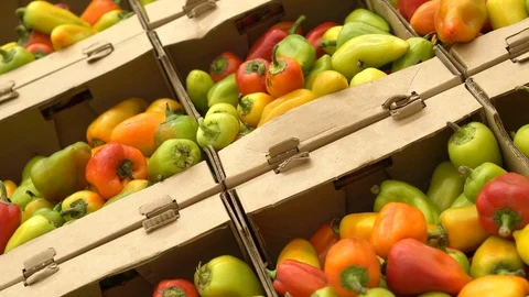A lot of red pepper closeup spinning on a 4K background in the store for buyer. Stock Footage 116792453