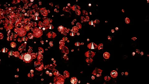 Lot of red ruby falling on a black table. Falling jewelry close up. Stock Footage 303234177