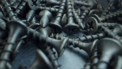 A lot of self-tapping screws close up. Working tools in the drawer and on the Stock Footage 170565389