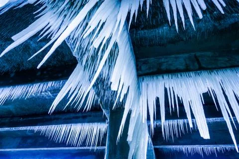 Lot of sharp and long icicles Stock Photos