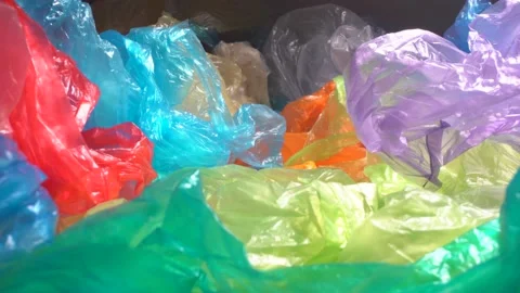 A lot of Single Use Plastic Grocery Shopping Bags in the Dump. Used packaging Stock Footage 144806851