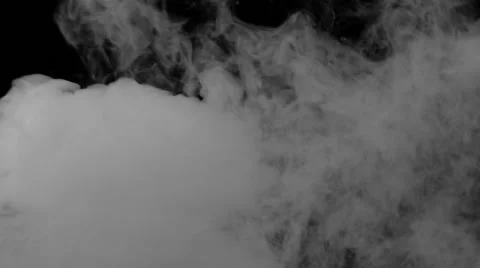 A lot of smoke from below, slowly floating and swirling Stock-Footage 50954448