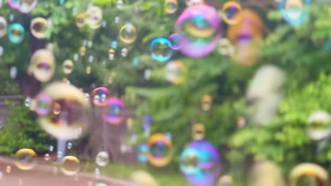 A lot of soap bubbles are flying away Video stock 310675679