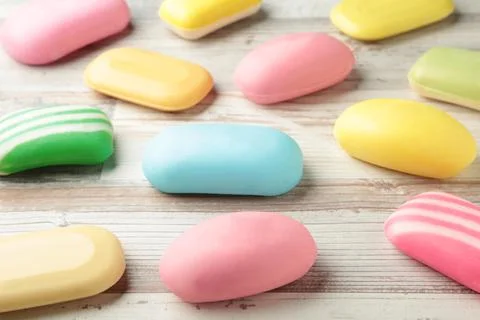 A lot of solid soap for hygiene and cleanliness on a light background. Stock Photos