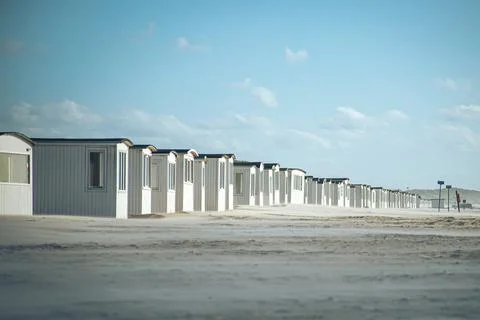 A lot of tiny white beach huts at Lokken in Denmark Stock Photos