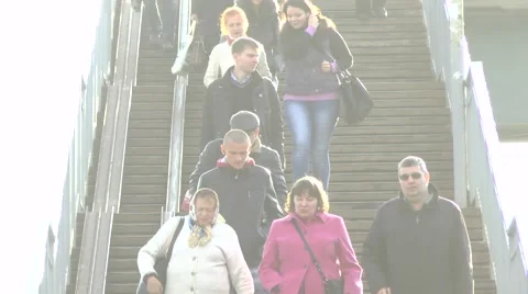 A lot of unknowns people go down the stairs Stock Footage 42055084