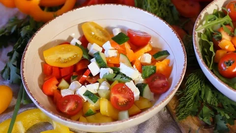 A lot of vegetables on the table. In round plates there are different kinds of Stock Footage