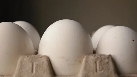 A lot of white eggs in a package Stock Footage 157712250