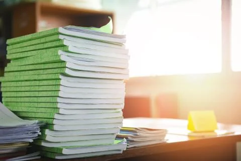 Lot of work document file working and book stacks of paper files searching in Stock Photos
