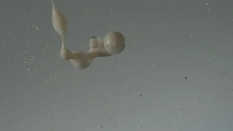 Lotion Poured into Water Stock Footage 75937101