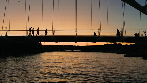Lots of activity on the Humber River bridge on a warm summer night Stock Footage 315697705
