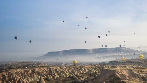 Lots of Air Balloons Flying Over Cappadocia Turkey Landscape Time Lapse Video Stock Footage 101397702