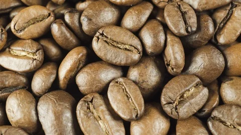 Lots of aromatic and invigorating coffee beans Stock Footage 104967872