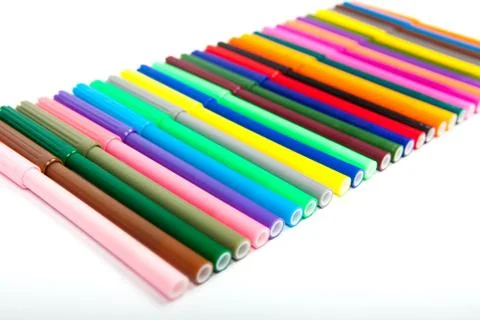 Lots of assorted colors marker pens isolated on white background Stock Photos