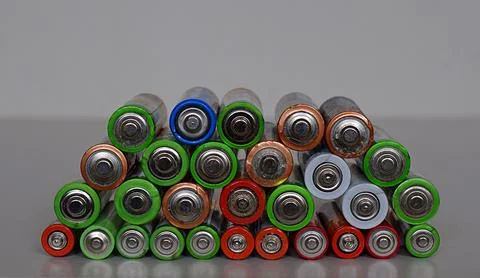 Lots of batteries in a column. Stock Photos