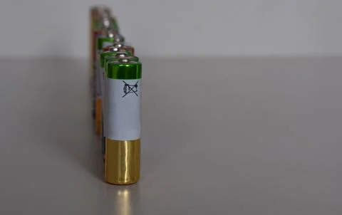 Lots of batteries in a column. Stock Photos