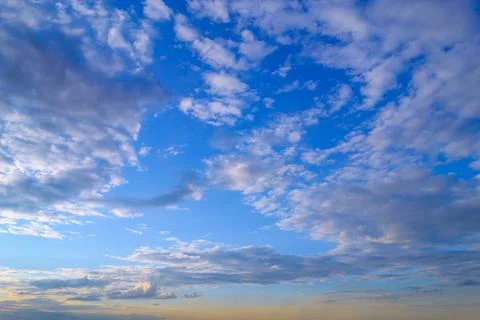 Lots of beautiful white clouds in the evening blue sky Stock Photos