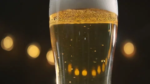 Lots of Beer Bubbles Lifting Up in a Glass Vídeos de archivo 166935477
