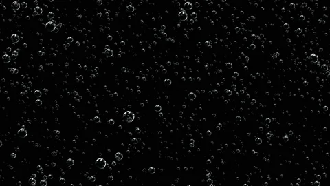Lots of bubbles in a dark space. The concept of soft drinks. Stock Footage 117356016