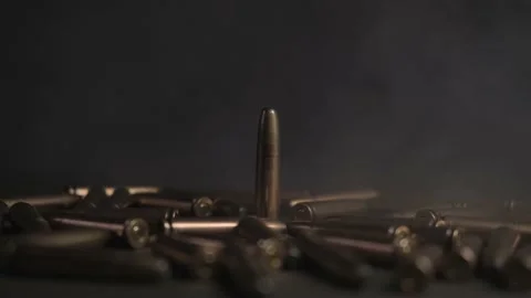 Lots of bullets. The bullets are on the table. Video stock 199089294