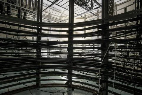 Lots of cables on the cable trays in the cable hub. Stock Photos