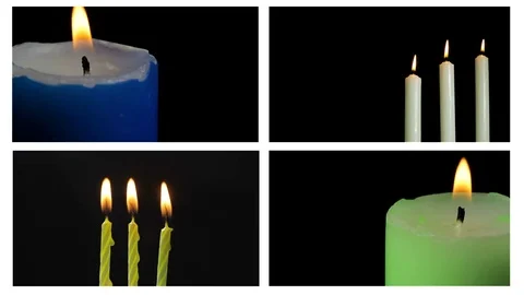 Lots of candles burning on black background Vidéo 71462777